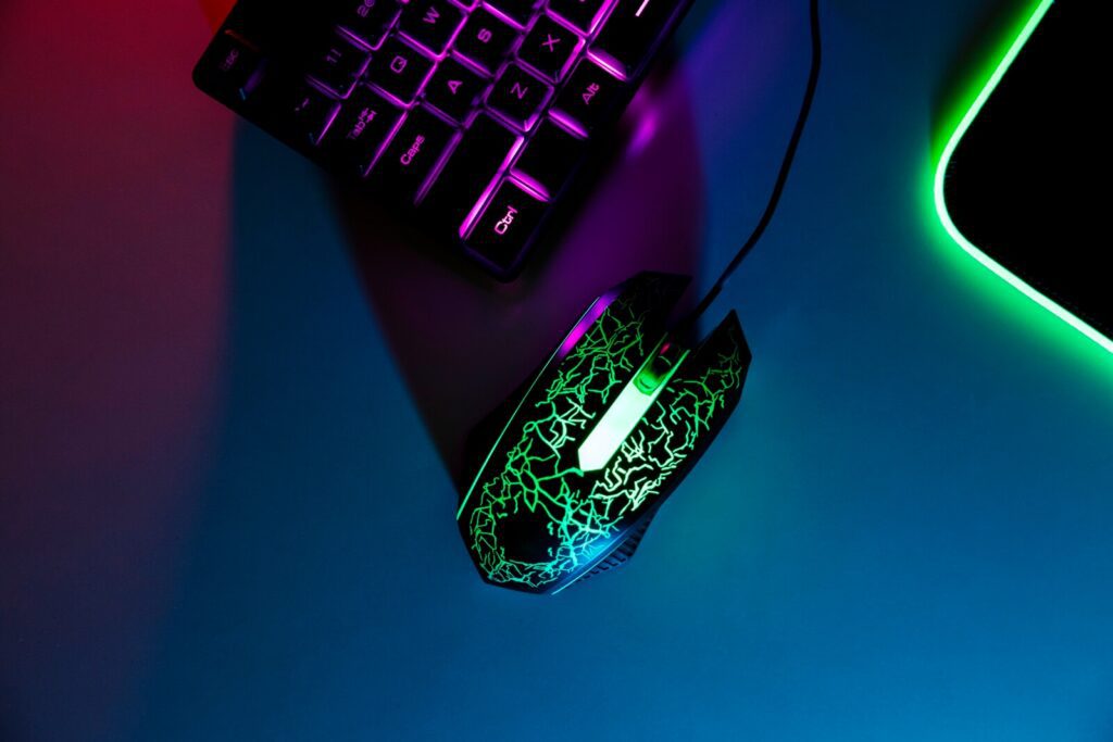 A wired gaming mouse with setup with a gaming keyboard